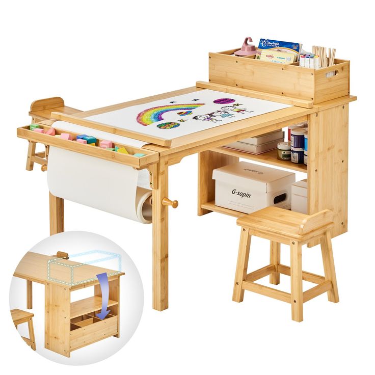 a wooden table with an art easel and drawers