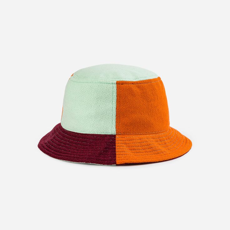 Colorful, patchwork jacquard knit bucket hat. Made from soft hypoallergic yarn and finished with deadstock neon contrast topstitching for a little extra pop of color. From sunny summer beach days to cold winter walks, this bucket hat is destined for year-round wear. All sale items are final sale and may not be returned or exchanged. Details Body: 100% Acrylic Lining: 100% Deadstock poly-cotton fabric Machine wash gentle, lay flat to reshape and dry8.5"w, 3.5"h, 2.25" brim, 22" interior circumfer Knit Bucket Hat, Contrast Topstitching, Uggs Outfit, Winter Walk, Jacquard Knit, Pink Mini, Slipper Boots, Beach Days, Cold Winter