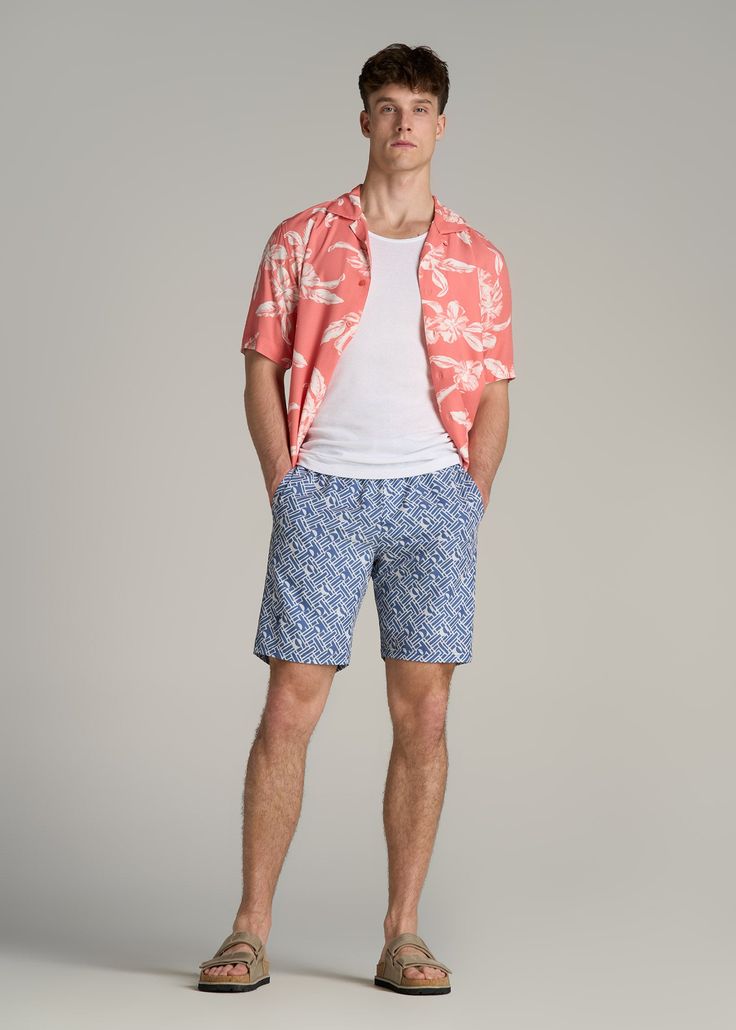 Make a Splash: Essential Swim Trunks for Tall Guys Dive Into Comfort & Style Ready to dive into summer? Our Volley Swim Shorts are here to ensure you do it in style. Crafted from quick-drying woven fabric, these tall men's swim trunks are designed for the guy who's ready to comfortably go from pool to party, featuring a stretch waistband with an external drawstring for a perfect, secure fit. Whether you're hitting the waves or lounging poolside, the above-knee length offers the ideal balance of Tropical Beach Bottoms With Pockets, Tropical Bottoms With Pockets For Summer, Tropical Style Summer Bottoms With Pockets, Tropical Summer Bottoms With Pockets, Beachwear Bottoms With Pockets For Warm Weather, Cotton Bermuda Bottoms For Beach Season, Casual Bermuda Beach Bottoms, Casual Blue Swim Shorts With Relaxed Fit, Cotton Beach Bottoms For Warm Weather