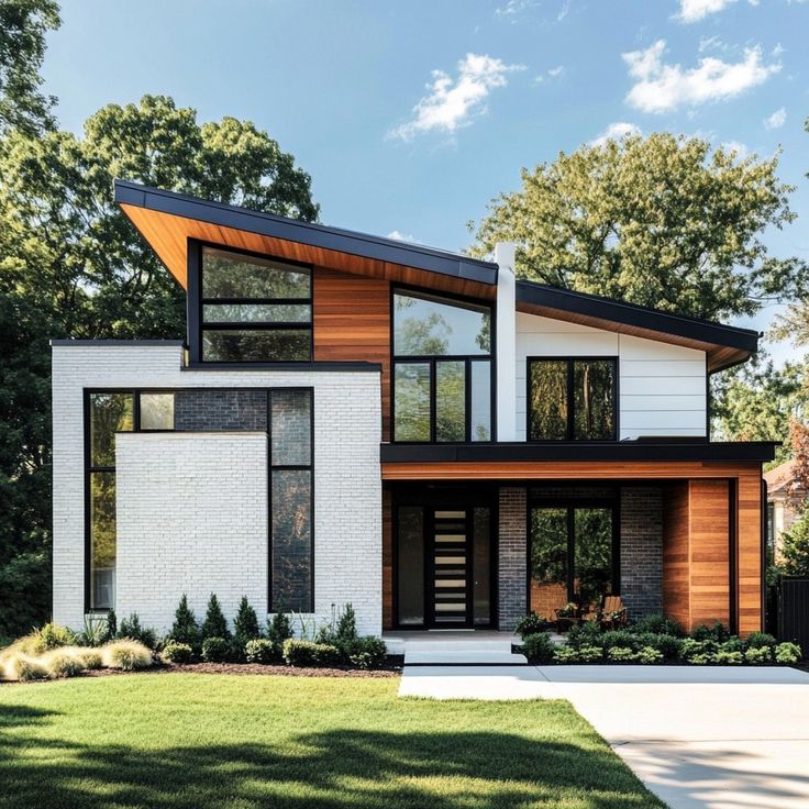 a modern house with white brick and wood trimmings on the front door, windows, and stairs