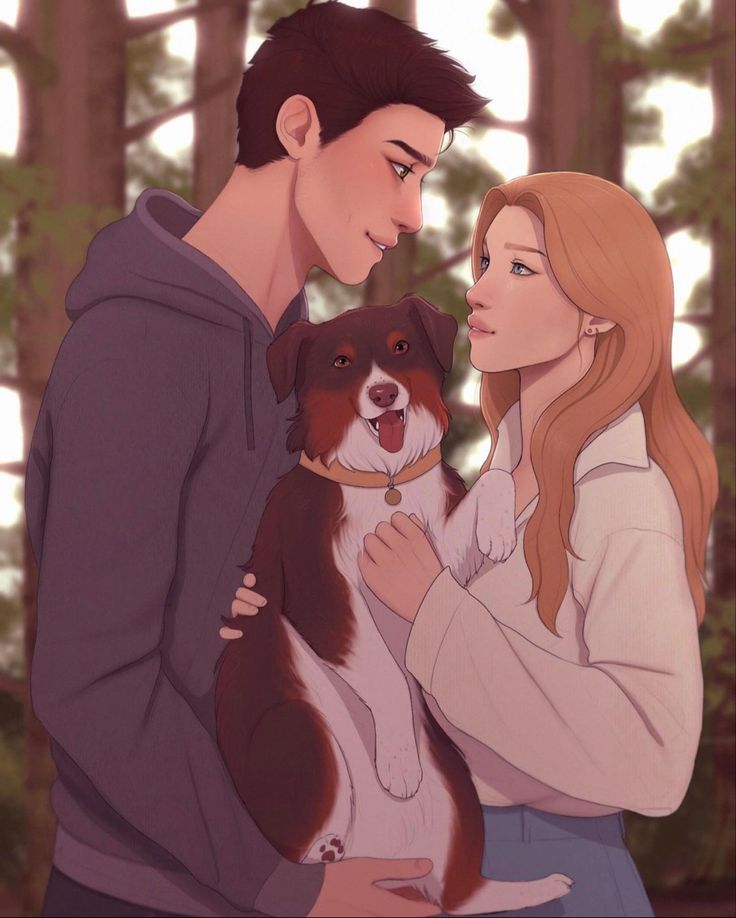 a man and woman are holding a dog in the woods