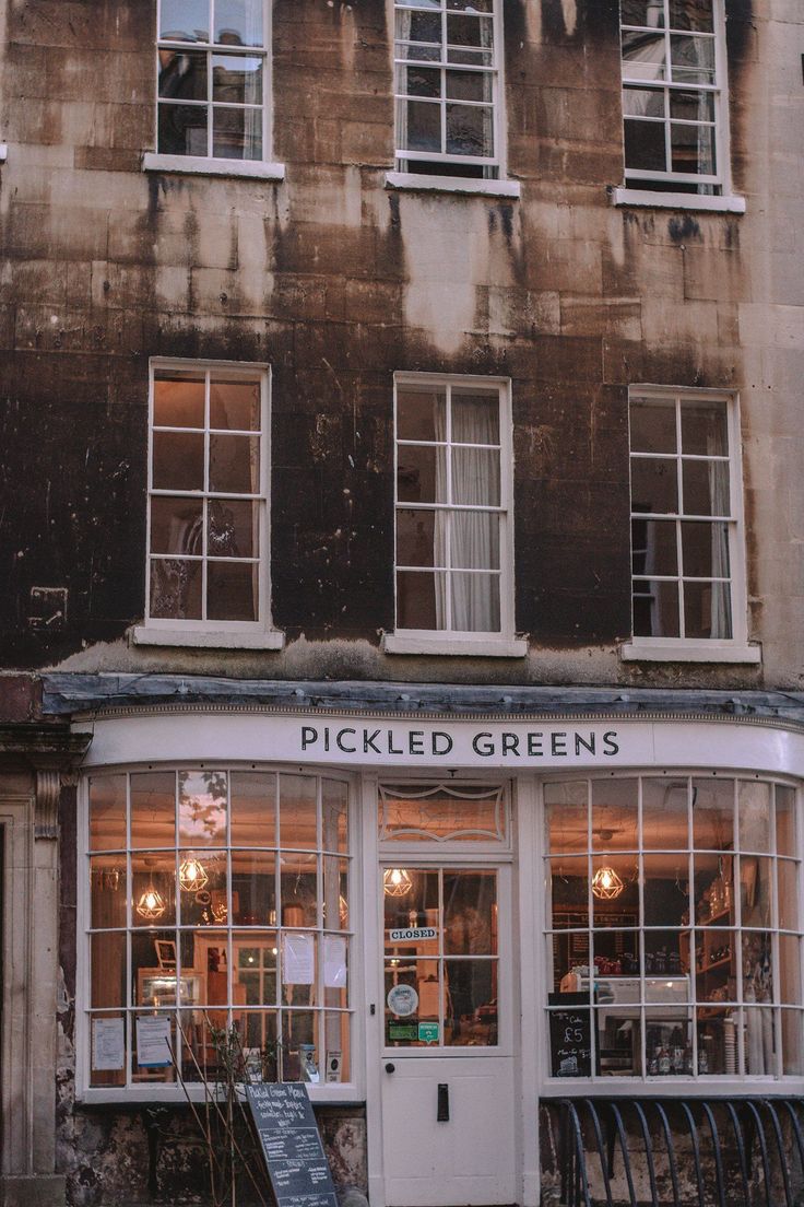 an old building with many windows on it