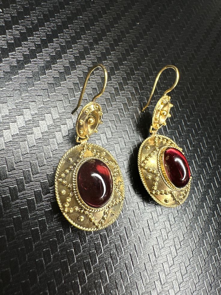 Beautiful 14k Yellow Gold Garnet Earrings Material: 14k Yellow Gold Gemstone: Garnet Type: Fishhook Total weight: 5.6 grams Time period of origin: circa 1870's Country of origin: England We have a GIA gemologist on our team. All jewelry items are authenticated. Antique Garnet Earrings, Garnet Earrings, Time Period, Antique Earrings, Fine Jewellery Earrings, Earrings Dangle, Fish Hook, Garnet, Jewelry Earrings Dangle