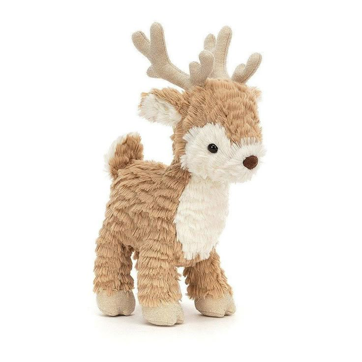 a stuffed animal that is brown and white with antlers on it's head