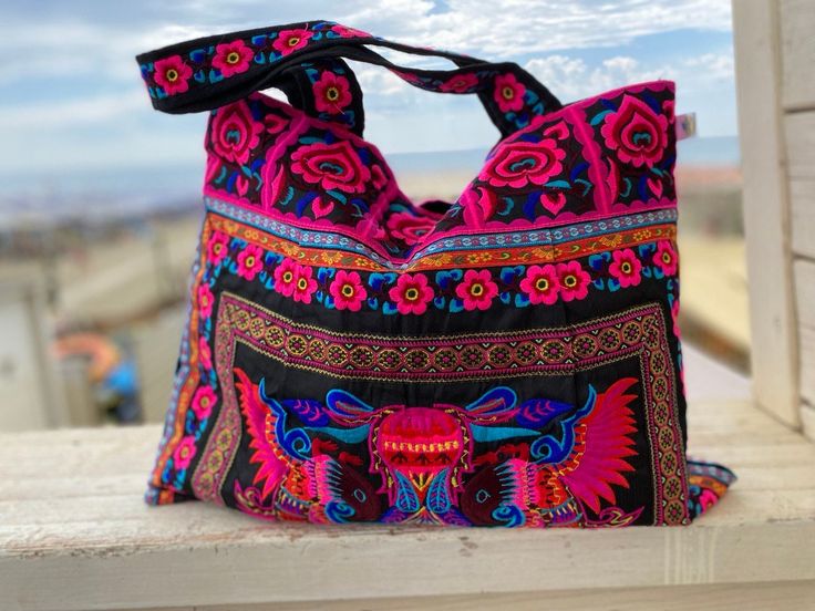 Ethnic vintage beach bag is colorful hobo bag in different colors. Vintage Handmade from Thailand for your colorful summer look. Vintage bags are a trendy accessory that gives style and status to the owner. Condition: very good Textile and machine embroidery I collect vintage jewelry and also create unique jewelry from rare materials brought from all over the world. My idea is that you do not have to look for accessories for the image in different places, but you can purchase a set of jewelry al Bohemian Style Summer Hobo Tote Bag, Bohemian Multicolor Beach Hobo Bag, Colorful Bohemian Bags For Market, Black Bohemian Hobo Bag, Bohemian Beach Bag For Summer, Bohemian Black Shoulder Bag For Festivals, Black Bohemian Shoulder Bag For Festivals, Traditional Travel Bags For Summer, Traditional Summer Travel Bags