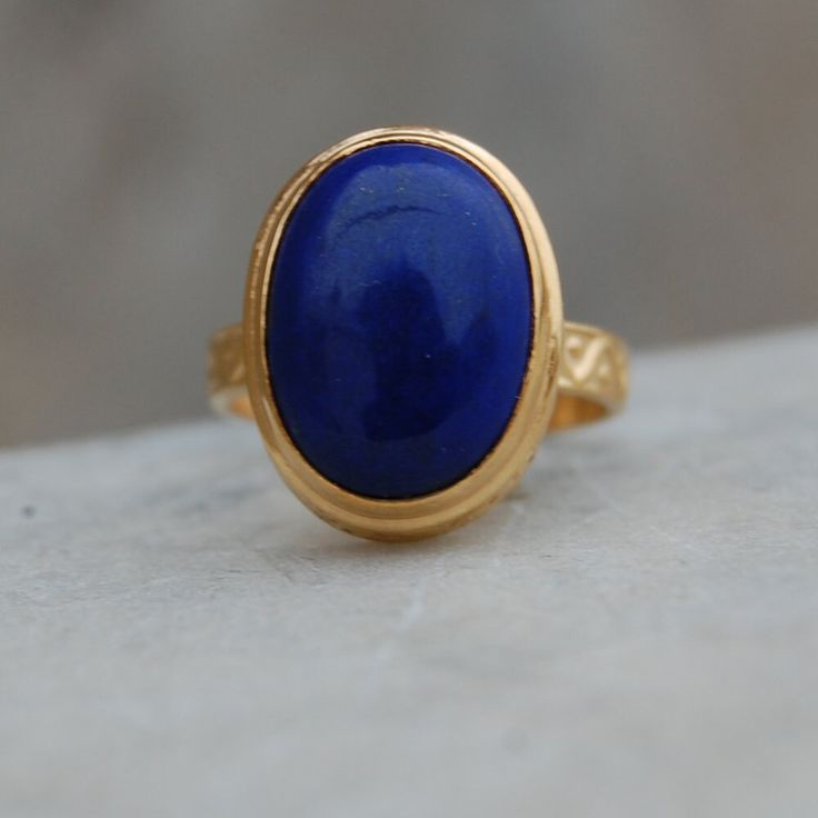 Oval Cab Blue Lapis Lazuli 925 Sterling Silver Ring, 18K Rose Gold, 18K Yellow Gold Round Lapis Ring, Blue Statement jewelry Gemstone : Lapis Lazuli Stone Size : 12 x 16 mm Ring Size : Please Choose Your Size stone Color : Blue Material : Please choose your metal It's a unique gift for anyone zodiac style ring . Please Notice before checkout :- Due to we use natural stones, the stones may vary slightly in shape, size and color. Contact us for any other gemstone customization before checkout. We Luxury Lapis Lazuli Gift Ring, Elegant Blue Oval Cabochon Signet Ring, Anniversary Yellow Gold Lapis Lazuli Rings, Elegant Lapis Lazuli Ring As Gift, 14k Gold Blue Cabochon Rings, Blue Cabochon 14k Gold Ring, Blue 14k Gold Signet Ring As Gift, Gold Lapis Lazuli Ring As Gift, Gold Lapis Lazuli Ring For Gift