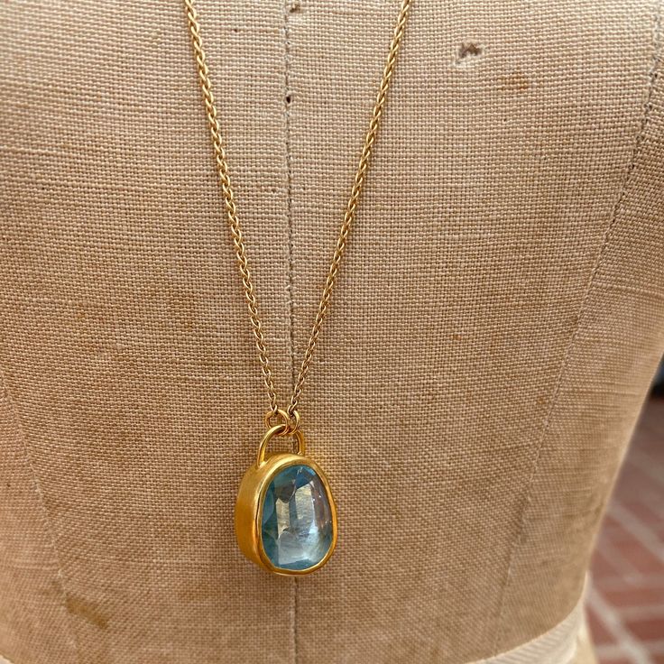 OVAL AQUAMARINE PENDANT SET IN 22K GOLD ON 18K GOLD CHAIN, 5.25 CARAT • DESIGNED AND HAND FORGED IN NEW YORK • LENGTH: 17.5 INCHES Please email info@elihalili.com or call the studio at 212-941-7979 for any inquiries. 18k Gold Chain, Aquamarine Pendant, Sapphire Pendant, Gold Chain Necklace, 22k Gold, Pendant Set, Aquamarine, Gold Chains, 18k Gold