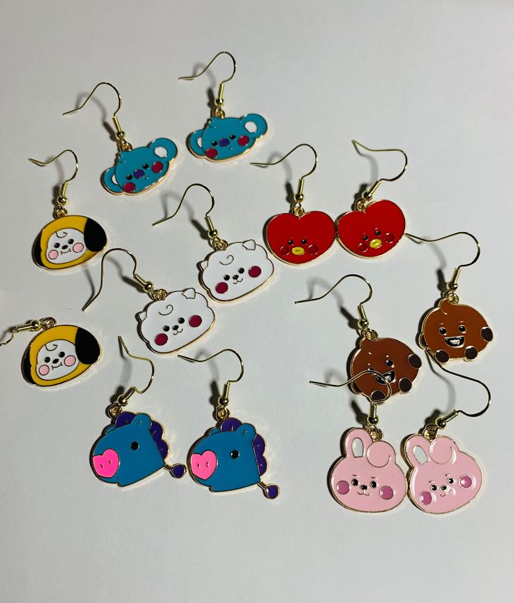 Enamel mascot dangle earrings.  Not too heavy, but still have a nice weight to them without being uncomfortable to wear!  Hooks are hypoallergenic for sensitive ears and come with a rubber backing. DISCLAIMER: There may be slight color variations due to computer monitor/phone resolutions. Since these are all handmade, some minor imperfections/variations are possible No refunds. However, if there's a significant issue, feel free to message me and I'll be happy to help if possible :) Trendy Enamel Nickel-free Earrings, Trendy Nickel-free Enamel Earrings, Trendy Hypoallergenic Enamel Earrings, Fun Hypoallergenic Drop Earrings, Adjustable Kawaii Dangle Earrings, Playful Hypoallergenic Dangle Earrings, Fun Nickel-free Enamel Jewelry, Nickel-free Enamel Jewelry With Fun Style, Nickel-free Enamel Fun Jewelry