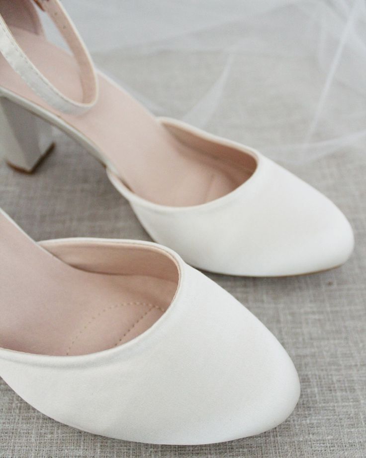 An all-time classic and elegant style with simplicity of satin heels and removable ankle strap.DETAILS:HEEL HEIGHT: 3 inchesCOLORS AVAILABLE: Champagne, White, Ivory, Navy, Burgundy, and Light BlueUPPER: Synthetic upper and liningMATERIALS: Mandmade outsoleSTYLE NAME: SARAH Heels Bride, Bridesmaids Shoes, Women's Slip Ons, Bridal Shoes Flats, Bow Women, Pointy Toe Flats, Bridal Heels, Bridesmaid Shoes, Satin Heels