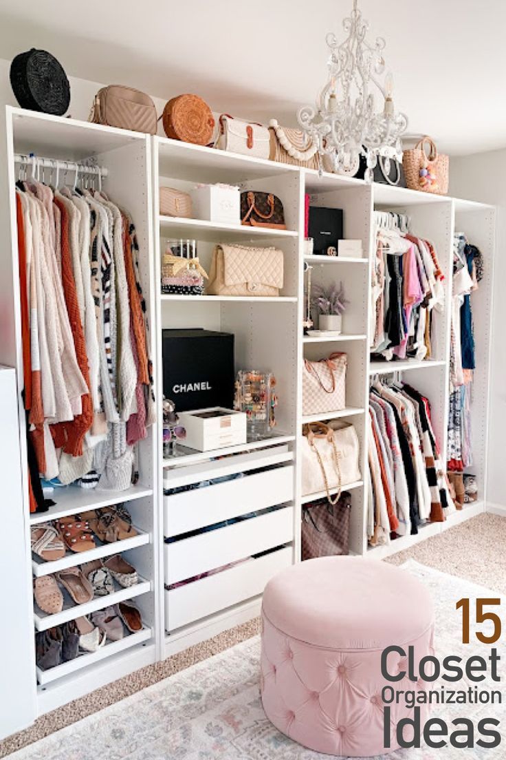 an organized closet with clothes, shoes and handbags on the shelves next to a chandelier