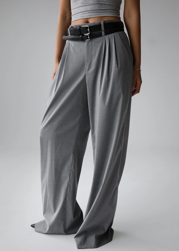 Color: Light Grey Midweight woven fabric Regular fit Wide leg Front pleated detailing Side seam pockets Back welt pockets Belt loops Zip fly Hook and bar closure Unlined 68% Lyocell  29% Viscose 3% Elastane Dry Clean By The Frankie Shop. Imported High Waist Gray Dress Pants For Business Casual, Elegant Gray Wide Leg Pants With Pockets, Spring Workwear Gray Dress Pants, Gray High Waist Wide Leg Pants For Business Casual, Gray Baggy Bottoms For Work, Gray Pants For Spring Workwear, Gray Baggy Pants For Workwear, Gray High-waisted Pants With Belt Loops, Gray Straight Pants With Belt Loops