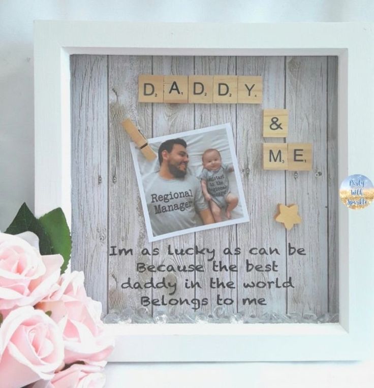 a photo frame with the words daddy and me on it