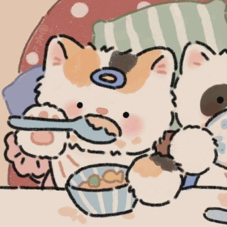 two cats are eating out of bowls on the table, one is holding a spoon