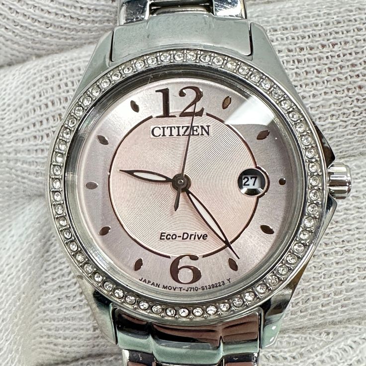 Citizen Eco-Drive stainless steel watch with pink champagne dial and crystal bezel Eco-Drive movement never needs winding or batteries with analog dial. Classic lines and a hint of sophistication allow for this Citizen Silhouette Crystal timepieces to stand out. Shining bright with crystals and featured in a stainless steel case and bracelet with blush pink dial. Includes date feature. Featuring Eco-Drive technology - powered by light, any light. Never needs a battery. Caliber number J710. Prote Pink Watch With Diamond Hour Markers, Pink Diamond Watch With Diamond Hour Markers, Swiss Army Pocket Knife, Army Watches, Swiss Army Watches, Citizen Eco, Brass Lantern, Eco Drive, Pink Champagne