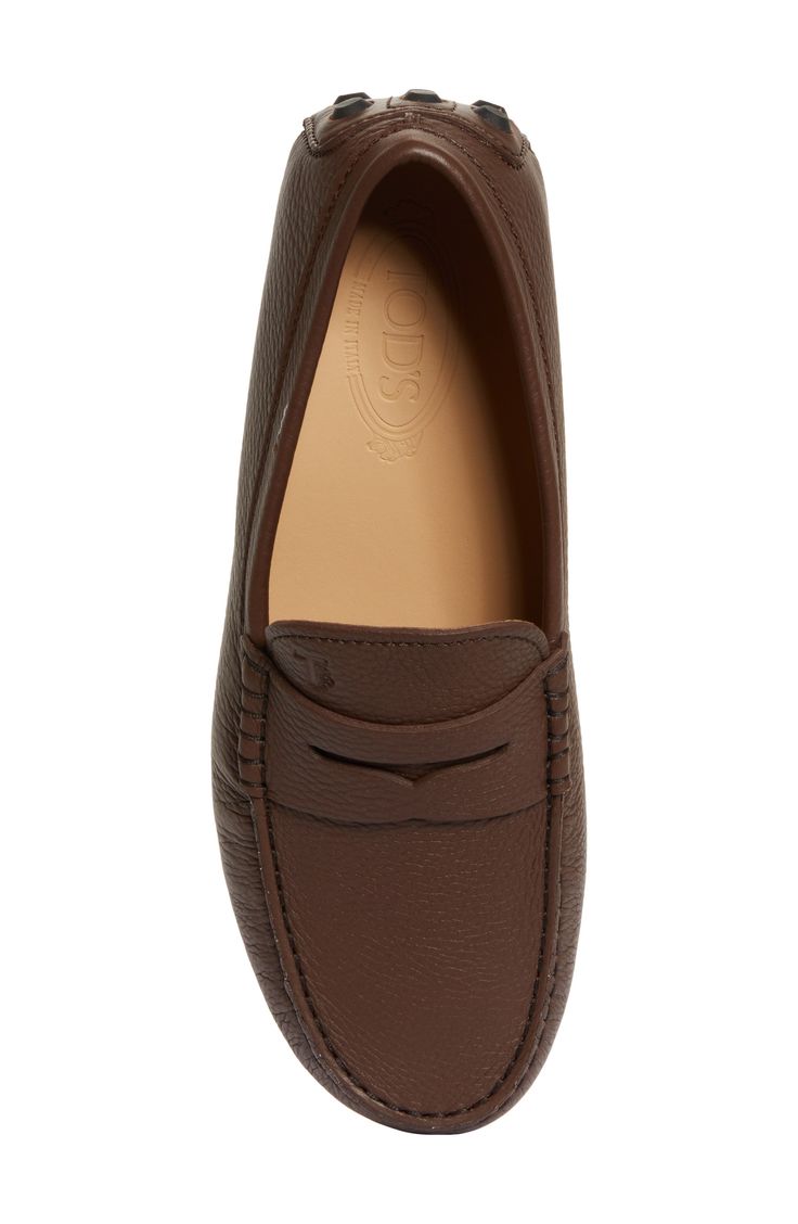 Inspired by 1950s driving shoes, this leather style is handmade with moc-toe stitching and a trademark pebbled sole that provides excellent traction. Leather upper and lining/leather and rubber sole Made in Italy Designer Shoes Leather Moc Toe Driving Moccasins, Calf Leather Moccasins With Leather Footbed, Calf Leather Moccasins With Moc Toe, Brown Leather Lining Moc Toe Loafers, Calf Leather Moccasins With Stitched Sole And Moc Toe, Brown Moc Toe Loafers With Leather Lining, Classic Leather Moccasins In Cognac, Leather Moc Toe Driving Shoes, Classic Leather Moccasins In Cognac Color