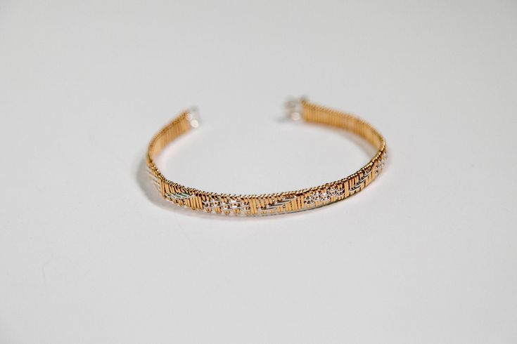 "Gorgeous hand woven Lauhala style bracelet comes in 14K Gold Filled Wire and Argentium Silver. This bracelet is non-tarnishing and has a clasp style closure. BRACELET SIZING: The following guide has been prepared to help you determine the correct size to order. First of all, when requesting a bracelet, I will give you exactly what you ask for. All bracelets are measured from the start of the weaving to the end of the weaving. This measurement will correspond to the actual wrist measurement. If Gold Woven Bracelet Jewelry, Handwoven Gold Bracelet Jewelry, Elegant Adjustable Woven Bracelets, Handwoven Gold Bracelet, Elegant Woven Adjustable Bracelets, Elegant Beaded Braided Bangle Bracelet, Elegant Beaded Braided Bracelets, Elegant Handwoven Silver Jewelry, Elegant Handmade Braided Bangle Bracelet