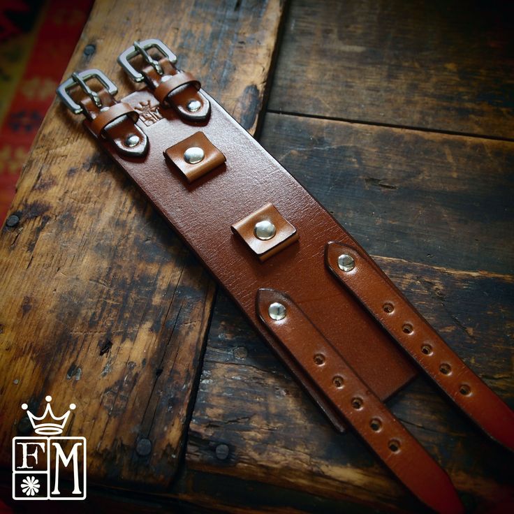 "This brown leather cuff is custom dyed rich brown . It features two watch connectors and uses two straps. Two quality stainless steel buckles provide the closure! A great width for any wrist! This cuff is inspired by the early Johnny Depp cuffs. can be used with or without a watch! Custom sized for your wrist! Please use the instructions above! I can also size it to accept your watch face. Just supply me with the watch dimensions per the last pic! - 2.25\" wide - Fine craftsmanship - Classic vi Adjustable Brown Steampunk Watch Accessories, Steampunk Leather Strap Watch Accessories, Classic Brown Leather Strap Cuff Bracelet, Adjustable Brown Classic Cuff Bracelet, Adjustable Classic Brown Cuff Bracelet, Luxury Brown Adjustable Cuff Bracelet, Classic Brown Cuff Bracelet, Brown Leather Bracelet With Palladium Hardware, Luxury Brown Leather Cuff Bracelet