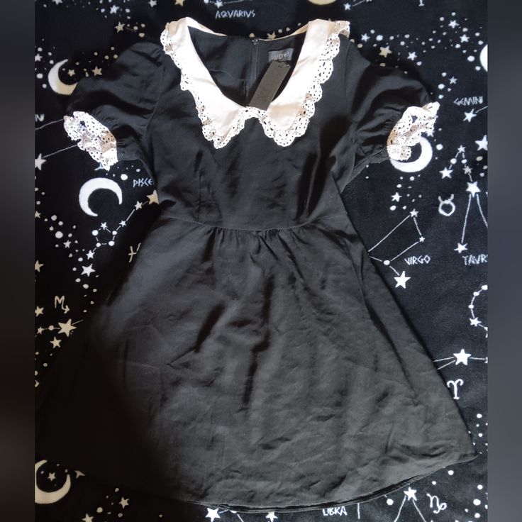 Bought This Dress A While Back. It's Loose On Me Now And Would Like The Money Back And Find Another One In The Correct Size. - Deadstock Item/Size - No Flaws Found - 93% Rayon, 7% Polyester - Machine Wash Cold, Hang Dry Please Refer To Dolls Kill's Size Guide On Their Website: Dollskill.Com/Size-Guide Fitted Mini Dress With Lace Collar And Short Sleeve, Gothic Short Sleeve Dress With Lace Trim, Fitted Black Mini Dress With Doll Collar, Black Fitted Mini Dress With Doll Collar, Casual Black Doll Collar Dress, Black Summer Dress With Peter Pan Collar, Casual Dress With Lace Trim And Doll Collar, Cute Black Mini Dress With Short Sleeves, Fitted Black Mini Dress With Lace Collar