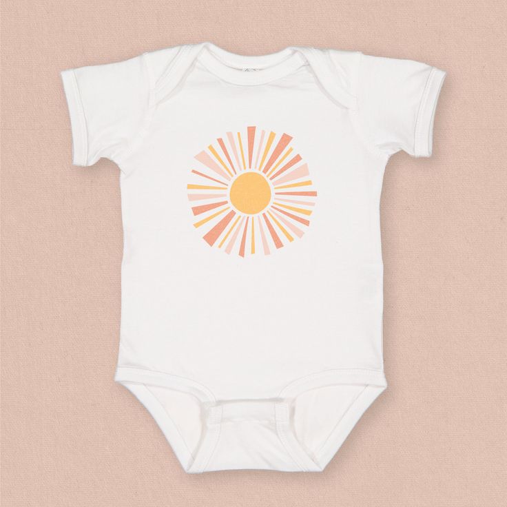 For that sunny baby🌞, this boho sunburst beach baby body suit is perfect. This soft and comfy baby outfit is perfect for a day at the beach, summer afternoon and makes a great gift for a new summer baby. DETAILS This soft comfy jumper is just the cuddle your little one needs. Featuring double-needle ribbed binding on neck, shoulders and leg opening with reinforced three snap closure, it'ss sure to keep up with any babe on the move. Check the size card to determine your perfect fit and for speci Printed Cotton Short Sleeve Bodysuit For Summer, Playful White Short Sleeve Bodysuit For Spring, Printed Onesie For Beach In Summer, Summer Playtime Short Sleeve Bodysuit, Unisex Short Sleeve Bodysuit For Summer Playtime, Summer Beach Onesie With Prints, Summer Beach Printed Onesie, Printed Summer Beach Onesie, White Short Sleeve Bodysuit For Summer