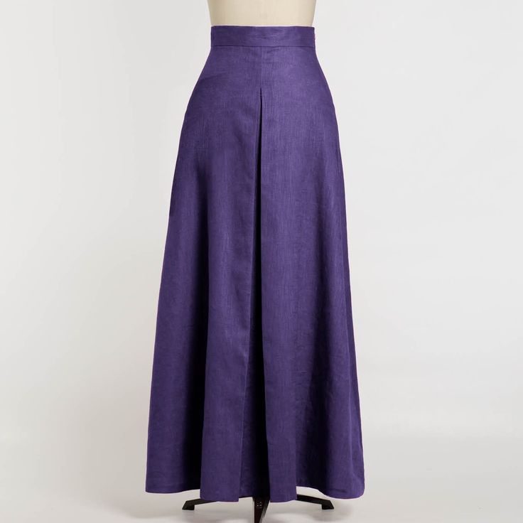 Long linen skirt with pockets and high waistband in purple. The A-line skirt is a wide skirt perfect for special occasions. It has a nice pleat on the front and back. Skirt length: 106 centimeters; 41,7 inches Elegant Fitted Lavender Skirt, Purple Lined Skirt For Evening, Elegant Purple Pleated Skirt, Elegant Full Skirt In Purple, Elegant Fitted Purple Maxi Skirt, Elegant Purple Full Skirt Bottoms, Elegant Full Purple Skirt, Elegant Full Linen Maxi Skirt, Purple Pleated Maxi Skirt