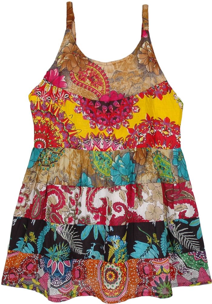 A top as pretty as a flower garden, this tiered baby doll tank top is a unique piece to have. With its sleeveless tank style and round neck, it's a fun casual comfortable piece to have on. #tlb #Sleeveless #Patchwork #vacationclothing #beachwrap #Floral #Printed #bohemianfashion #bohotanktop #summerhippietanktop Sleeveless Multicolor Ruffled Top, Multicolor Sleeveless Ruffled Top, Multicolor Sleeveless Top With Ruffles, Playful Floral Print Sleeveless Top, Playful Sleeveless Tank Top For Vacation, Playful Sleeveless Floral Print Top, Fun Sleeveless Tank Top For Spring, Summer Tiered Tops For Vacation, Sleeveless Patchwork Tops For Beach