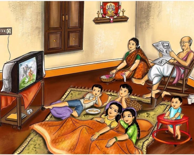 a family sitting on the floor watching tv