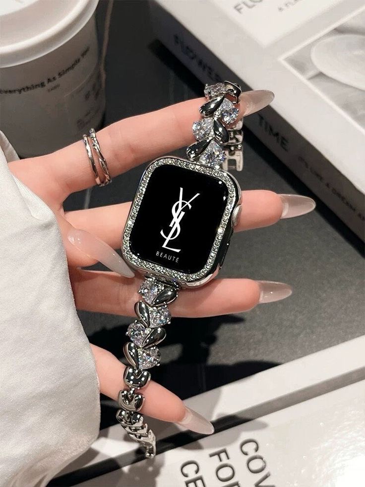 Introducing the Cute Diamond Heart Bracelet iWatch Band! This stunning accessory is designed to elevate your Apple Watch Series 1, 2, 3, 4, 5, 6, 7, 8, 9 Ultra Generation. With its diamond heart design, it adds a touch of elegance and sparkle to your wrist. The adjustable chain ensures a perfect fit for your 38mm, 40mm Trendy Silver Bracelet Jewelry, Trendy Silver Jewelry With Bracelet Strap, Trendy Silver Watch Bands As Gift, Trendy Silver Metal Apple Watch Band, Trendy Stainless Steel Watch Band Gift, Custom Silver Stainless Steel Watch Accessories, Stainless Steel Watch Chain Accessories Gift, Personalized Silver Stainless Steel Watch Accessories, Metal Chain Watch Accessories As Gift