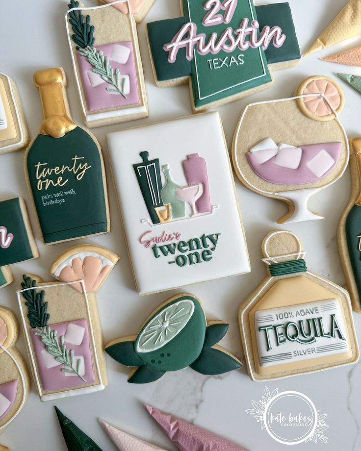 decorated cookies are displayed on a table