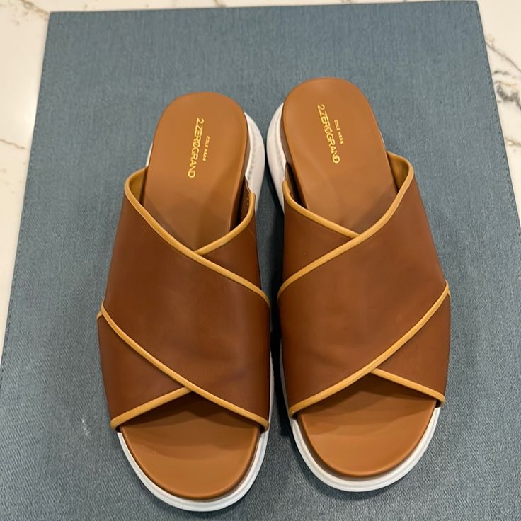 Cole Haan Camel Color Leather Upper Sandal. New Without Tags. Worn In The House Only. In “Like New” Conditon. 2.Zerogrand Line- 1.5” Foam Wedge,Lightweight, Cushion Sole. Beautiful Leather Upper. Super Comfortable! Size6.5b- True To Size. Leather Slides In Tan For Summer, Tan Leather Casual Sandals, Summer Tan Leather Slides, Casual Tan Sandals With Leather Sole, Tan Leather Slip-on Sandals, Leather Slide Sandals, Camel Color, Leather Slides, Cole Haan Shoes