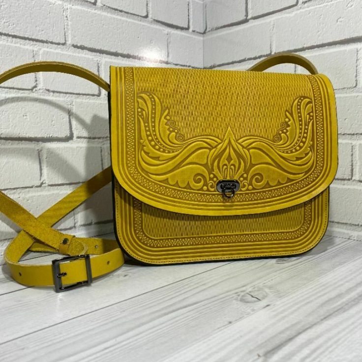 » A-Store « » Seller Profile « » Feedback profile « » Send us a message « Women's Yellow HANDMADE embossed LEATHER bag lady's Handbag KAMEIA The best handmade leather goods of various shades and textures first hand from the manufacturer. Here are the original products made of genuine leather. There are many models, among which it is easy to choose the right one. ATTENTION!!! Color tones may differ from the photo on the screen of devices depending on the type of screen and color reproduction. In Textured Leather Rectangular Saddle Bag, Leather Saddle Bag With Adjustable Strap, Embossed Top Handle Bag For Travel, Leather Handheld Saddle Bag With Adjustable Strap, Rectangular Textured Leather Saddle Bag, Embossed Top Handle Travel Bag, Yellow Leather Rectangular Flap Bag, Yellow Rectangular Leather Flap Bag, Embossed Satchel Shoulder Bag For Everyday Use