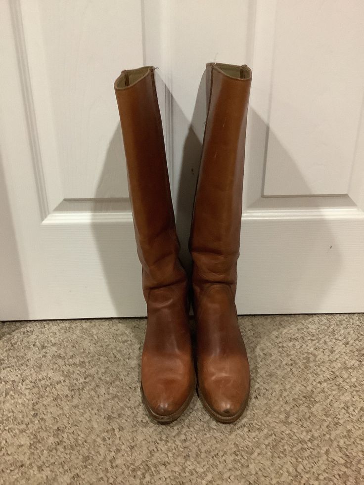 This nice vintage Frye chestnut distressed patina tall boho wood stacked heel boots size 5.5 size 6.5. As you can see from the pictures of the heels/ shows wear on back tip of heel. Will need a heel guard at some point in time. Pls look at the coloring of the boots distressed and broken in patina leather/the size marked inside is 6.5 inside. But vintage shoes depending on the designer can tend to run smaller. So pls compare to the measurements I give you. Ok vintage cond. Vintage Brown Knee-high Boots For Fall, Vintage Wide Calf Knee-high Boots For Fall, Brown Vintage Boots For Fall, Vintage Brown Rustic Boots For Fall, Vintage Brown Wide Calf Boots, Vintage Fall Boots With Stacked Heel, Vintage Boots With Stacked Heel For Fall, Brown Vintage Wide Calf Boots, Vintage Leather Heeled Boots For Western-themed Events