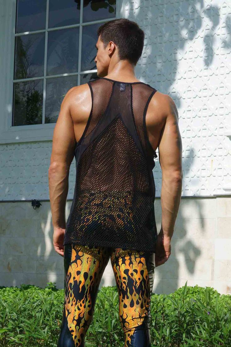 Perfect for those hot summer days and late-night dance parties, this mens mesh tank top features paneling in different mesh fabrics for a unique, eye-catching look. Crafted from high-quality, super breathable mesh materials, this see through fishnet top will keep you cool and comfortable all day (and night) long. The black color gives it a sleek and versatile appearance, while the mixed mesh paneling adds a touch of edginess and style. Whether you're looking to stand out in the crowd or just wan Stretch Racerback Vest For Summer, Summer Gym Racerback Vest, Summer Racerback Gym Vest, Breathable Sleeveless Tank Top For Summer, Black Gym Vest For Summer, Sporty Racerback Vest For Summer, Black Summer Gym Vest, Breathable Tank Vest For Summer, Breathable Tank Top Vest For Summer