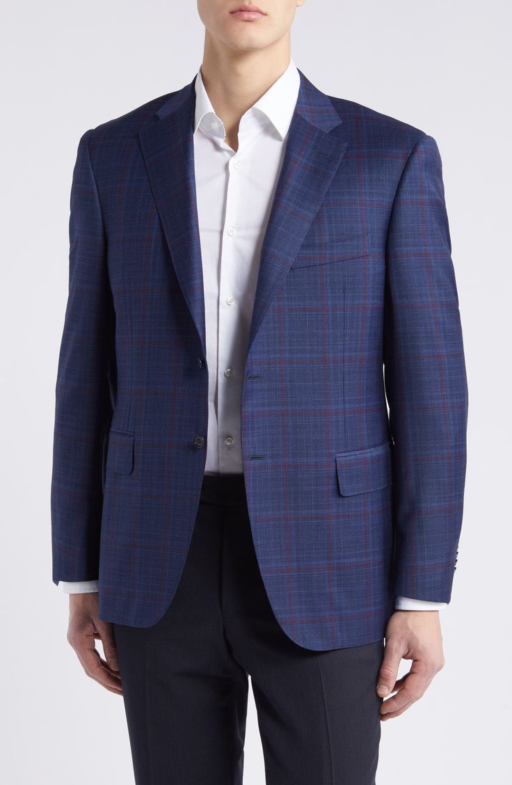 Italian wool woven in a navy-hued plaid brings polish and distinction to a sport coat styled with traditional detailing to elevate any semiformal look. Notched lapels Nonfunctional four-button cuffs Cuff buttons may not be attached. Jackets purchased at full price can have the sleeve length customized for free at your local Nordstrom Chest welt pocket; front flap pockets Side vents Lined 100% wool Dry clean Made in Italy Formal Plaid Tweed Jacket With Concealed Placket, Luxury Custom Fit Wool Blazer, Designer Notch Lapel Sport Coat For Business, Designer Sport Coat With Notch Lapel For Business, Formal Plaid Blazer With Hidden Button Closure, Formal Plaid Blazer With Hidden Buttons, Luxury Plaid Tweed Jacket With Welt Pockets, Luxury Custom Fit Suits For Fall, Designer Business Suits For Fall