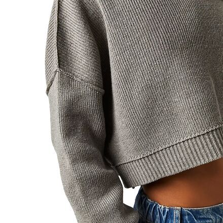 The Free People Easy Street Crop Pullover features a slouchy fit, slightly exaggerated sleeves, and cropped cut for a little peek of tummy. It's our throw-on-and-go sweater with an eco-conscious design that's made in part with recycled fibers to conserve resources. Fall Cropped Sweater With Relaxed Fit, Relaxed Fit Cropped Sweater For Fall, Fall Cropped Hem Relaxed Fit Tops, Boxy Fit Long Sleeve Cropped Sweater, Fall Relaxed Fit Cropped Tops, Fall Crew Neck Crop Top With Ribbed Cuffs, Winter Cropped Relaxed Fit Tops, Winter Relaxed Fit Cropped Tops, Boxy Fit Cropped Sweater With Ribbed Cuffs For Fall