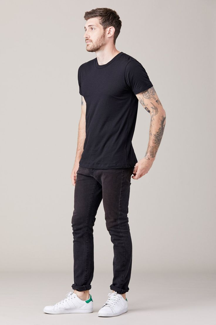 Our classic men's staple for everyday wear Our men's tees are sized for a slim fit. If you prefer a looser fit, we recommend sizing up. Model is wearing a size Large. His measurements are: Height: 6'1" Waist: 31" / Suit: 40"L / Inseam: 32" Material: 100% Cotton Urban Stretch Cotton T-shirt, Urban Stretch Short Sleeve T-shirt, Black Casual Tops With Straight Hem, Casual Black Tops With Straight Hem, Casual Black Top With Straight Hem, Black Fitted T-shirt For Everyday, Fitted Black T-shirt For Everyday, Black Stretch T-shirt For Everyday, Classic Black Stretch T-shirt