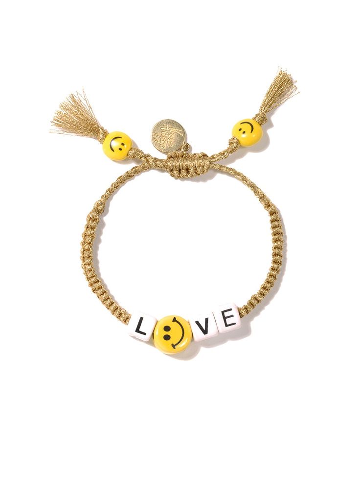 Love to see you smile 😃 6" Adjustable gold threadwork Drawstring closure (extendable up to 8") Gold plated brass hardware Ceramic charms Handmade in New York City. ﻿﻿Due to the handmade nature of our products, some charms may vary in color and style or be replaced if unavailable. Please allow 5-7 business days for production. Smiley Bracelet, Ceramic Charms, Love Smiley, Bracelet Gold, You Smile, Brass Hardware, Smiley, Handmade Natural, See You