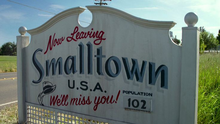 there is a sign that says smalltown usa and we miss you