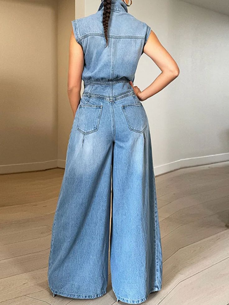 As a vintage sleeveless denim wide-leg jumpsuit, the Trend4us Jumpsuit exudes style and comfort. Made from high-quality materials, it offers a timeless and versatile look, perfect for any occasion. Embrace your individuality with this trendy and chic wardrobe essential. Size Bust Waist Hips Length S 85 cm (33.46 in) 70 cm (27.56 in) 95 cm (37.40 in) 146 cm (57.48 in) M 90 cm (35.43 in) 75 cm (29.53 in) 100 cm (39.37 in) 147 cm (57.87 in) L 95 cm (37.40 in) 80 cm (31.50 in) 105 cm (41.34 in) 148 cm (58.27 in) XL 100 cm (39.37 in) 85 cm (33.46 in) 110 cm (43.31 in) 149 cm (58.66 in) 2XL 105 cm (41.34 in) 90 cm (35.43 in) 115 cm (45.28 in) 150 cm (59.06 in) Specification: Style: Streetwear Age: Middle Age Origin: Mainland China Season: Spring/Summer Material: Cotton Decoration: Spliced Fabric Preppy Mode, Jumpsuit Fitted, Style Overalls, Streetwear Chic, Jeans Overall, Streetwear Mode, Vintage Preppy, Estilo Preppy, Denim Romper