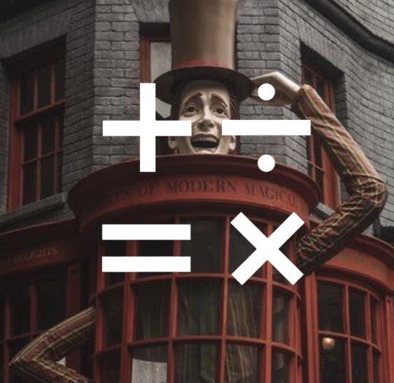 an image of a statue on top of a building with the word x in front of it