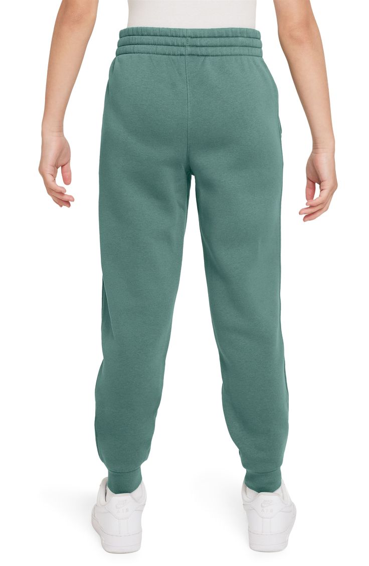 An embroidered Swoosh marks one pocket of these kid-size joggers that will keep them cozy from the classroom to the playground and back. 80% cotton, 20% polyester Machine wash, tumble dry Imported Nike Cotton Joggers, Comfortable Nike Cotton Joggers, Comfortable Cotton Nike Joggers, Nike Green Casual Sweatpants, Green Cotton Sweats With Pockets, Nike Cotton Joggers With Pockets, Green Nike Joggers With Pockets, Nike Cotton Sweatpants With Ribbed Cuffs, Nike Cotton Sweatpants With Elastic Waistband