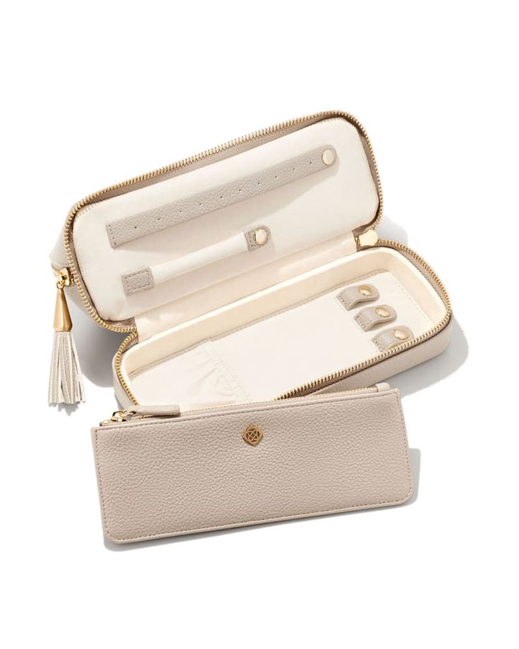 A multifunctional travel case that’s perfect for getting ready on the go. Featuring a top zipper cosmetics bag and bottom jewelry storage compartment, keep your jewels and products organized and within reach thanks to the Cosmetic & Jewelry Case in Taupe. Elegant Rectangular Jewelry Storage For Daily Use, Elegant Travel Cosmetic Bag With Zipper, Elegant Cosmetic Bag With Zipper Closure For Travel, Elegant Cosmetic Bag With Zipper For Travel, Elegant Travel Cosmetic Bag With Zipper Closure, Elegant Travel Case With Zipper Closure, Elegant Travel Cases With Zipper Closure, Elegant Travel Cosmetic Bag With Case, Elegant Case With Removable Pouch