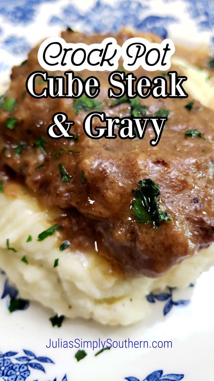 crock pot steak and gravy on top of mashed potatoes with parsley