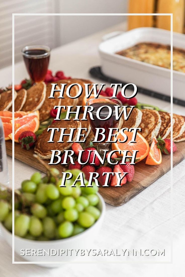 the best brunch party food is served on a cutting board with grapes and oranges