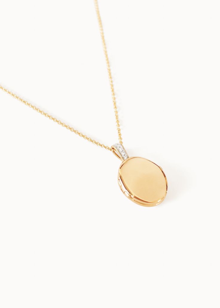 Home is where the heart is. Our Maison Gold Lockets are heirlooms that represent a moment in time. Keep this locket as a family heirloom forever. Wear her blank or get her engraved with your signature letter. To engrave more than one letter, visit HERE.Already have a chain? To purchase the locket individually, visit HERE. Photo dimensions: 14mm x 11.5mmTo add a photo inside, simply open the locket and carefully press the photo into place. Our lockets do not have a separate opening for a photo. F Gold Lockets, Oval Locket Necklace, 10k Gold Chain, Fall Rings, Oval Locket, Photo Dimensions, Moment In Time, Gold Locket, A Moment In Time