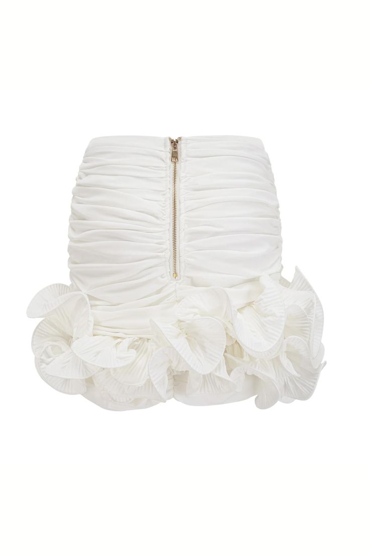 Add a touch of elevated elegance to your wardrobe with our Asymmetrical Hem Ruffle Ruched Skirt. This pleated skirt features intricate ruching and is adorned with delicate 3D flowers along the hem. Perfect for any occasion, this skirt effortlessly combines femininity and sophistication. Pair it with this ruffle top. Silhouette: Pleated Material: Polyester Elasticity: Slight Stretch Closure: Zipper Lined The Model is wearing size S Elegant Summer Draped Skirt With Ruffles, Elegant Draped Skirt With Ruffles For Summer, Elegant Summer Draped Ruffled Skirt, Elegant Ruffled Draped Skirt For Summer, Elegant Draped Ruffled Skirt For Summer, Pleated Fitted Draped Skirt For Party, Fitted Pleated Draped Skirt For Party, White Ruffled Mini Skirt For Party, Fitted Party Bottoms With Folds