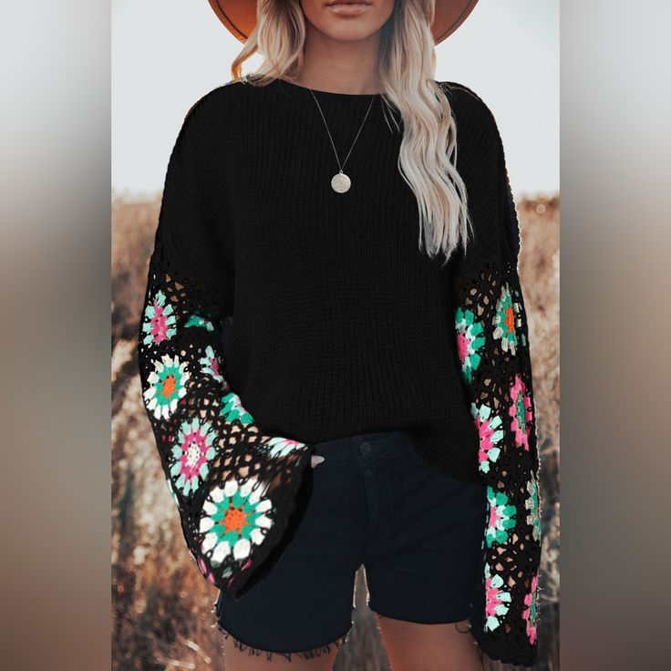 Black Floral Crochet Bell Sleeve Loose Sweater Bohemian Blouse Mix The Crochet Trend With A Comfy Style In This Sweater The Delicate Floral Crochet Sleeves Are Eye-Catching While The Plain Ribbed Design Is Quite Well-Received It Has A Boat Neckline, Dropped Shoulders, And A Relaxed Fit Brand New In Packaging Black Long Sleeve Bohemian Crochet Top, Bohemian Crochet Lace Blouse For Fall, Fall Bohemian Crochet Lace Blouse, Black Crochet Lace Top For Fall, Black Long Sleeve Crochet Lace Top, Black Bohemian Crochet Top, Black Bohemian Crochet Top With Crochet Trim, Black Long Sleeve Crochet Top For Spring, Black Long Sleeve Crochet Top For Summer