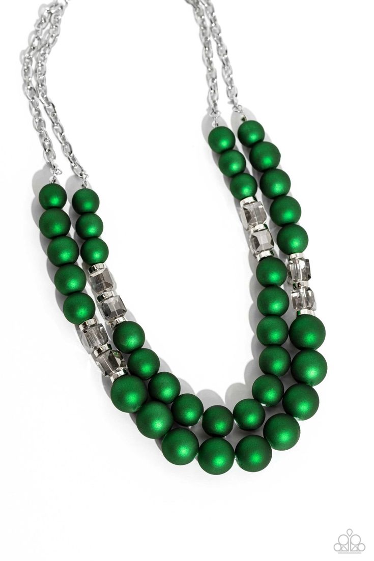 Two rows of oversized emerald green beads featuring a subtle shimmer, silver accents, and clear gray cubed beads fall below the collar on silver paperclip chains, creating refined, colorful layers. Features an adjustable clasp closure.

 Sold as one individual necklace. Includes one pair of matching earrings. 

Get The Complete Look!
Bracelet: "Shopaholic Showdown - Green" (Sold Separately) Accessories Website, Gray Ring, Gray Necklace, Yellow Rings, Brown Bracelet, Green Beads, White Necklace, Chic Jewelry, Pink Ring