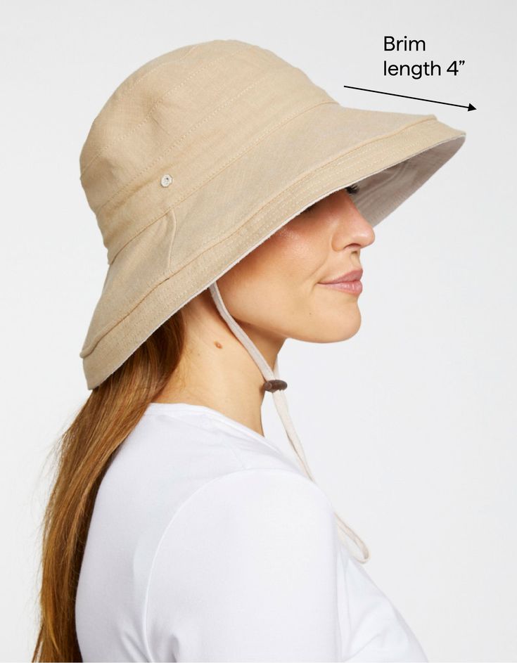 [[start tab]] SUN PROTECTIVE SUN HAT PRACTICAL SUN PROTECTION Our Holiday Sun Hat is sure to be your go-to sun hat if you're looking for maximum coverage and style. The brim is flexible and benefits from an internal wire to give it a fully customizable shape. Adjustable to your size and style, the hat features a reversible double layer of luxurious cotton-linen blend fabric with a drawcord to keep it secure. Easy to pair with any outfit, it will keep your face, ears and neck protected whilst kee Spring Bucket Hat With Uv Protection And Adjustable Fit, Solid Brimmed Sun Hat With Uv Protection, Adjustable Fit Summer Hat Upf 50+, Upf 50+ Brimmed Panama Hat One Size, Solid Hats With Uv Protection And Adjustable Fit, Adjustable Brimmed Beach Hats, Lightweight Summer Visor Hat, Solid Wide Brim Bucket Hat With Upf 50+, Upf 50+ Brimmed Panama Hat