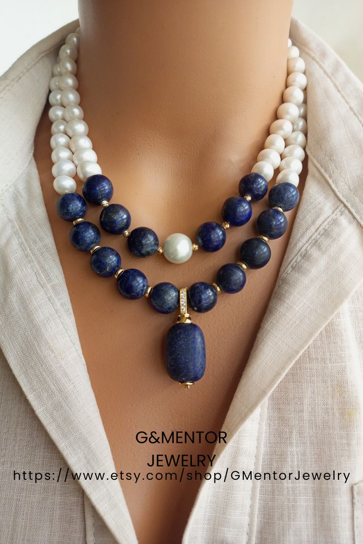 A timeless accessory that embodies natural beauty, our elegant Pearl and Lapis Lazuli Necklace combines lustrous freshwater pearls, known for their lustrous and iridescent appeal, with the deep blue appeal of genuine Lapis Lazuli gemstones. Handmade with love and attention to detail, this stunning necklace exudes a sense of opulence and elegance. Elegant Double Strand Necklace For Anniversary, Elegant Double Strand Necklace For Weddings, Elegant Stone Necklace For Anniversary, Elegant Handmade Double Strand Crystal Necklaces, Double Strand Fine Jewelry For Wedding, Elegant Handmade Double Strand Crystal Necklace, Elegant White Double Strand Jewelry, Classic Round Lapis Lazuli Jewelry, Elegant Double Strand White Jewelry