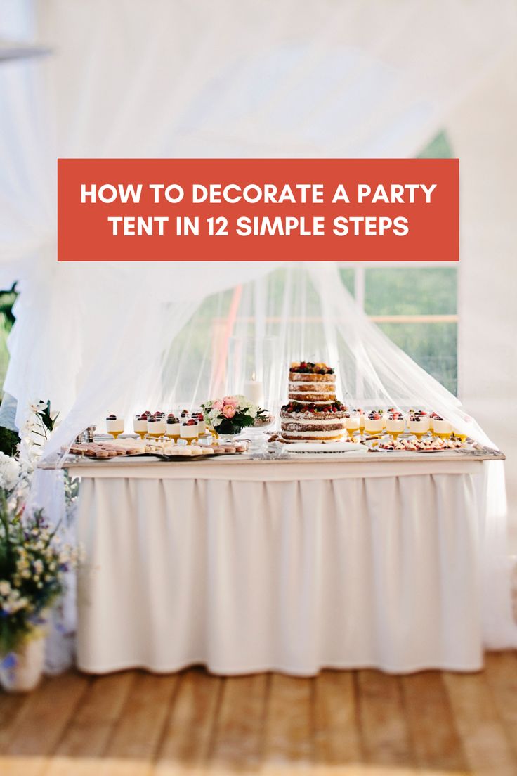 a table topped with cakes and desserts under a tent